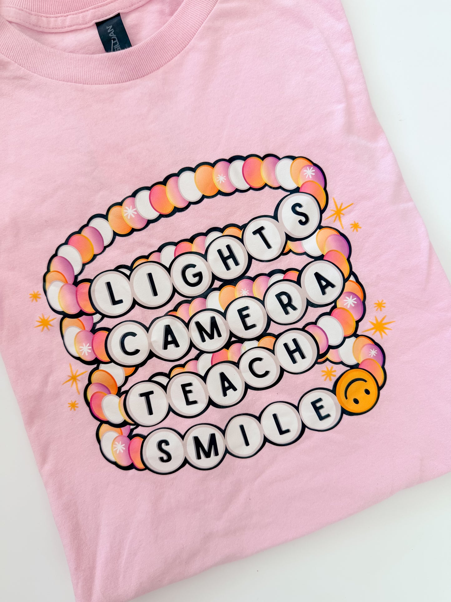 Lights Camera Teach Smile Tee